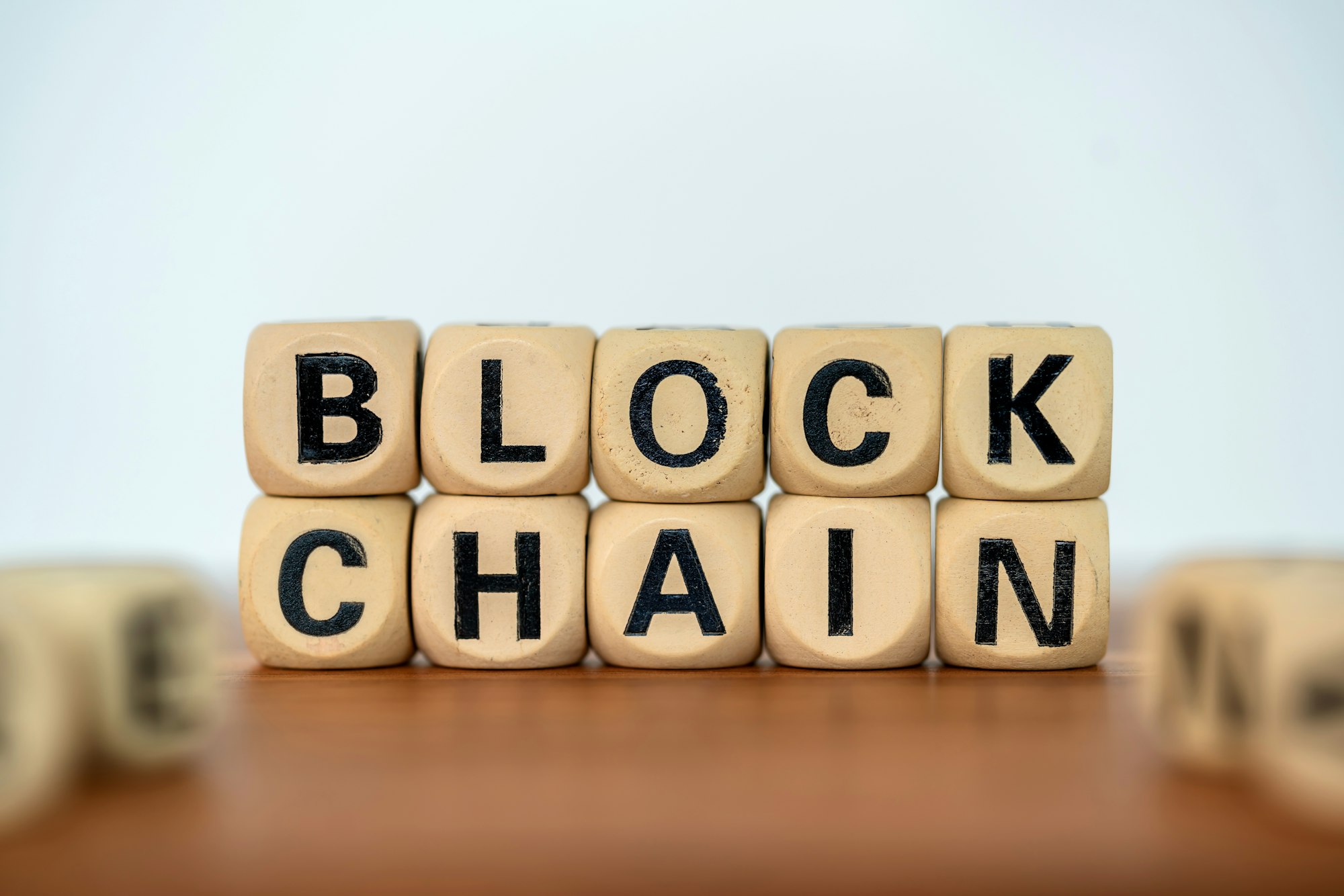 Close up word blockchain on wooden block